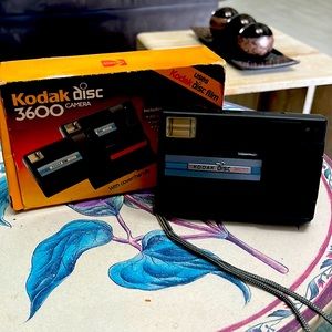 Kodak disc 3600 camera with cover and handle.